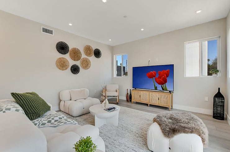 Living Room  lavish and spacious living area with modern decor, comfortable seating, and a bright open-concept layout.