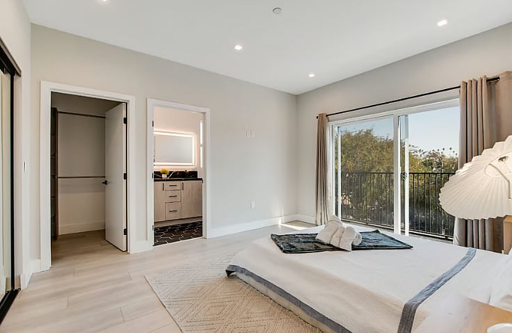 A3 Master Bedroom  Spacious room with dual-sink bathroom and two exterior closets for extra storage and convenience and private balcony.(2nd picture)
