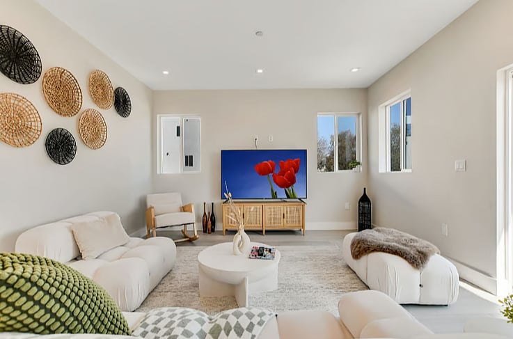 Living Room  Lavish and spacious living area with modern decor, comfortable seating, and a bright open-concept layout.