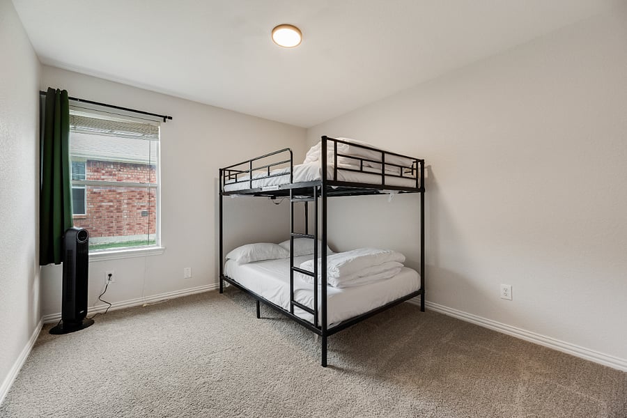 Second bunk room with Full-over-Full beds, colorful LED lighting and charging station a space adults & kids will absolutely love!