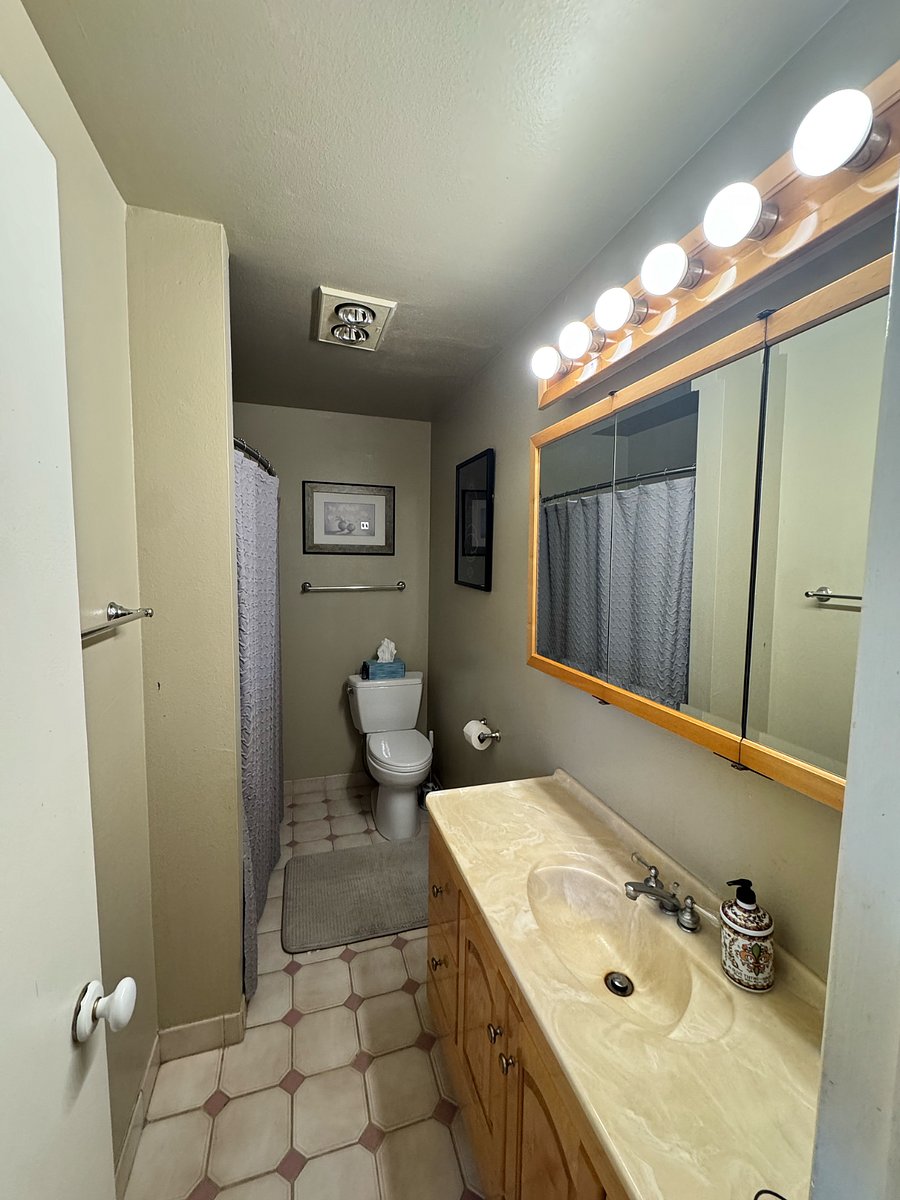 Private bath with shower and tub.