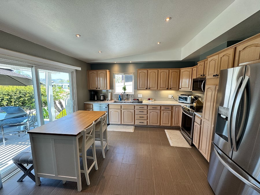 Kitchen- Dishwasher, microwave, dual oven, and toaster over.