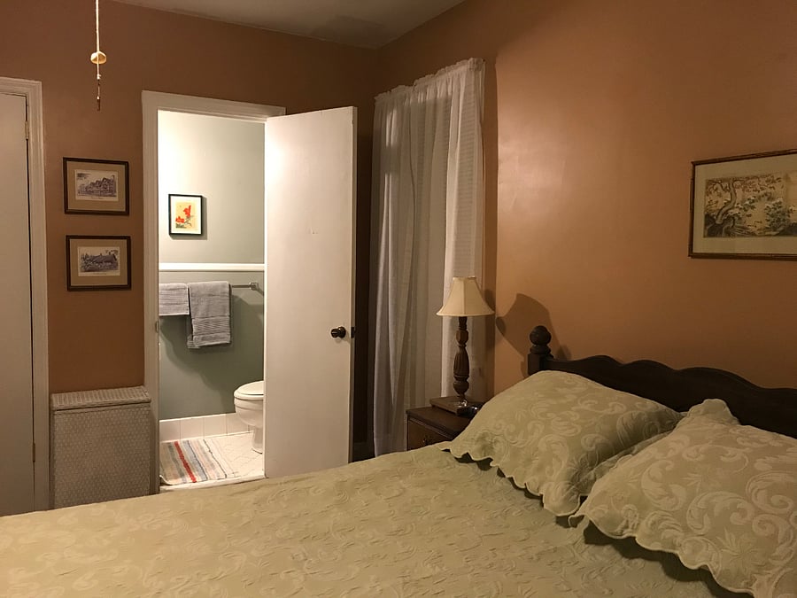 Master bedroom with half bath