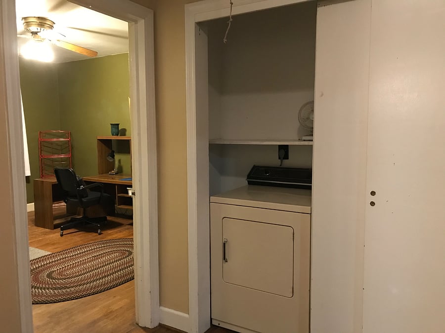 Large hall closet includes dryer