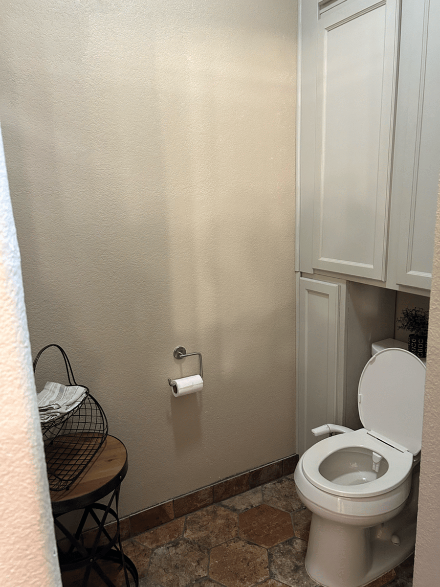 Master toilet is behind door and has bidet