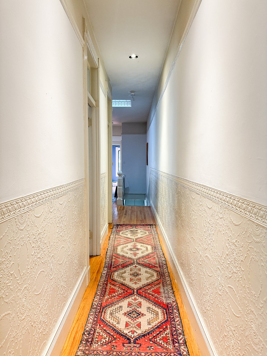 Hallway to front door stairs