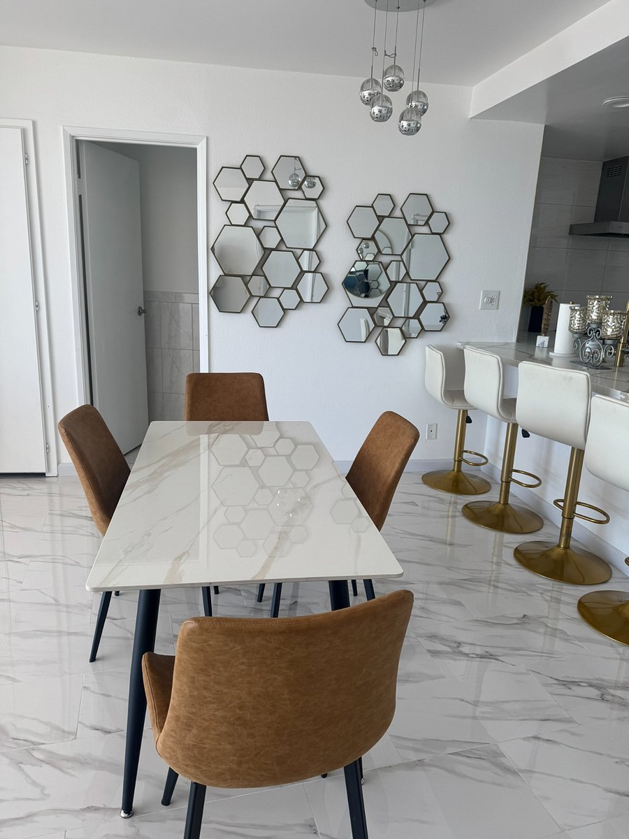 Dining room table and chairs with natural light