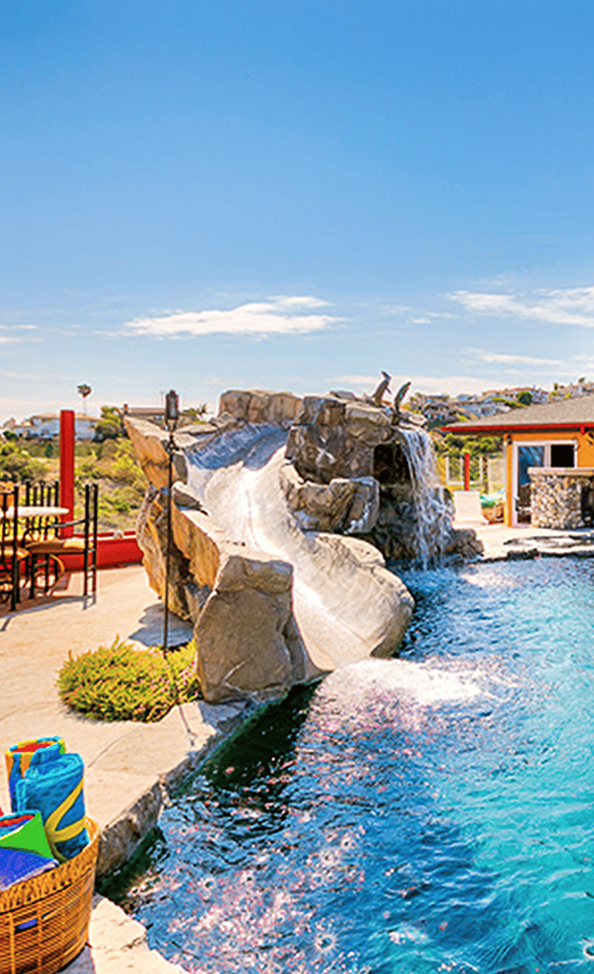 Slide, waterfall and grotto.