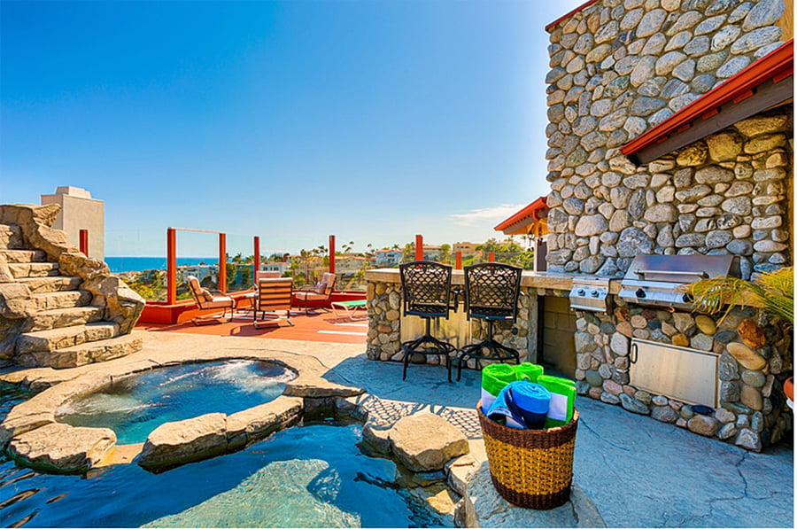 Outdoor BBQ with large serving area.