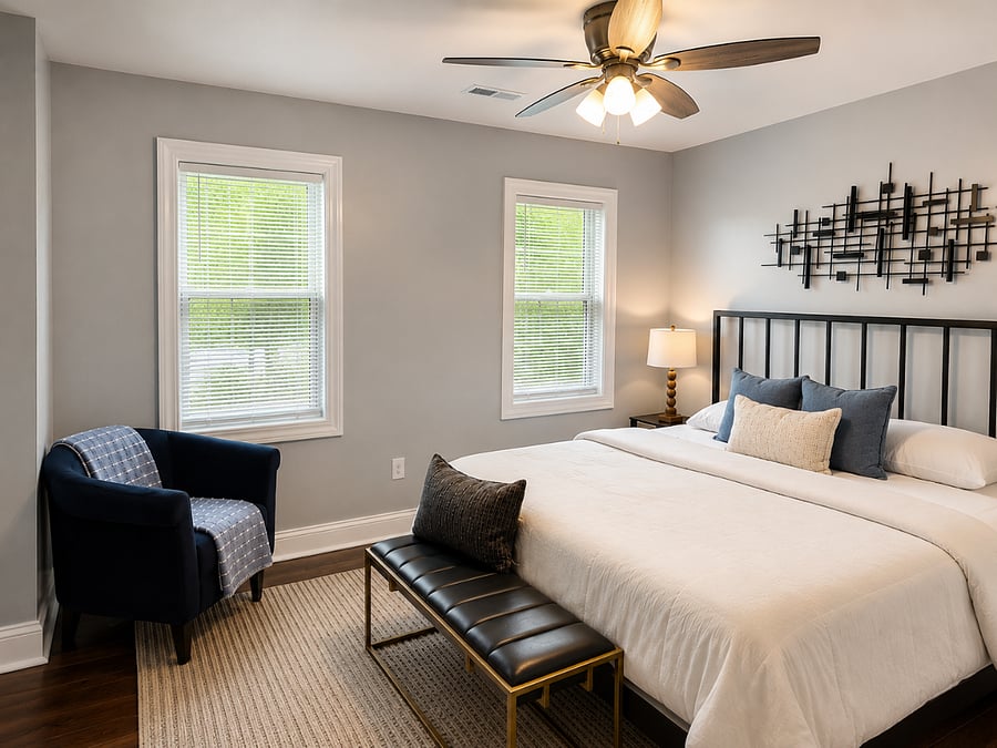 Relax in a cozy, stylish king bedroom featuring comfortable bedding, modern decor, and plenty of