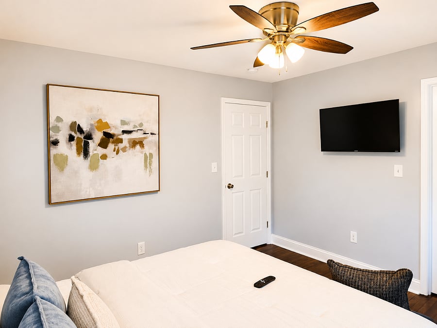 Serene main bedroom with King bed and smart tv