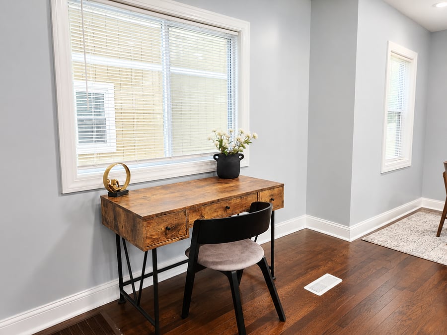 Dedicated workspace with natural light perfect for remote work, studying, or extended stays.