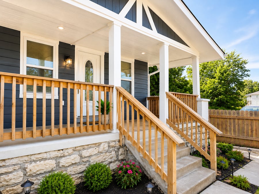 Charming covered front porch with private entry and plenty of space to relax outdoors.