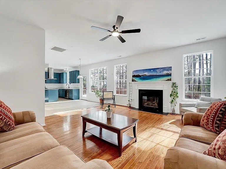 Gorgeous sunlit massive Family room with fireplace and 7.5 channel pre wired surround sound 