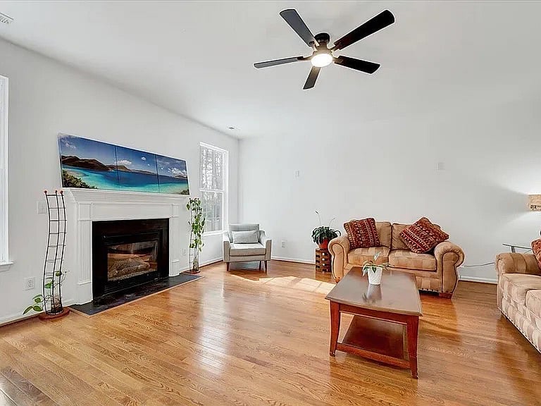 Huge sunlight, family room with fireplace is where family life revolves and com entails