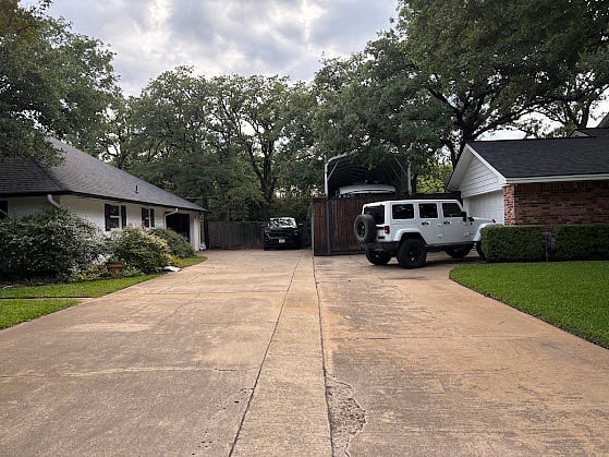Driveway with access and space in covered garage