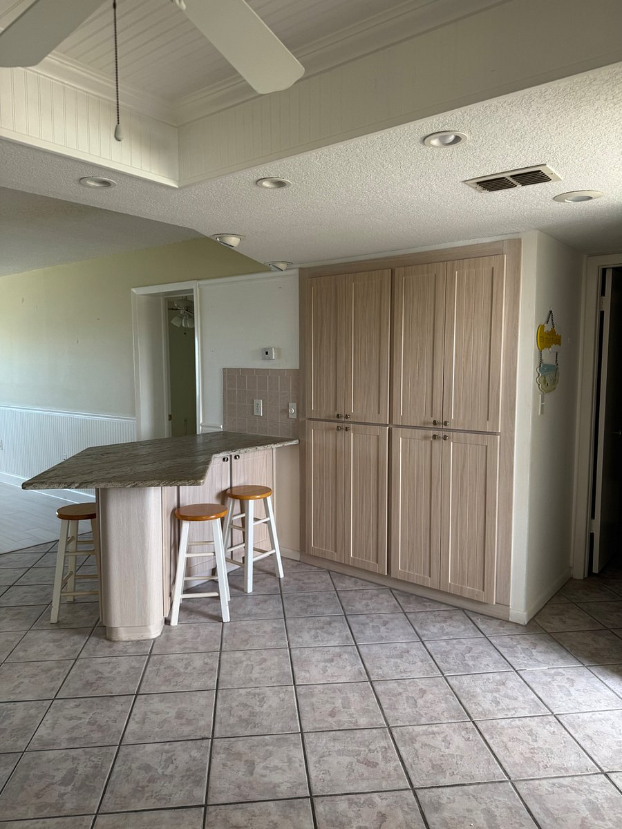 Nice large island to cook or sit at, different Barstools for counter being delivered