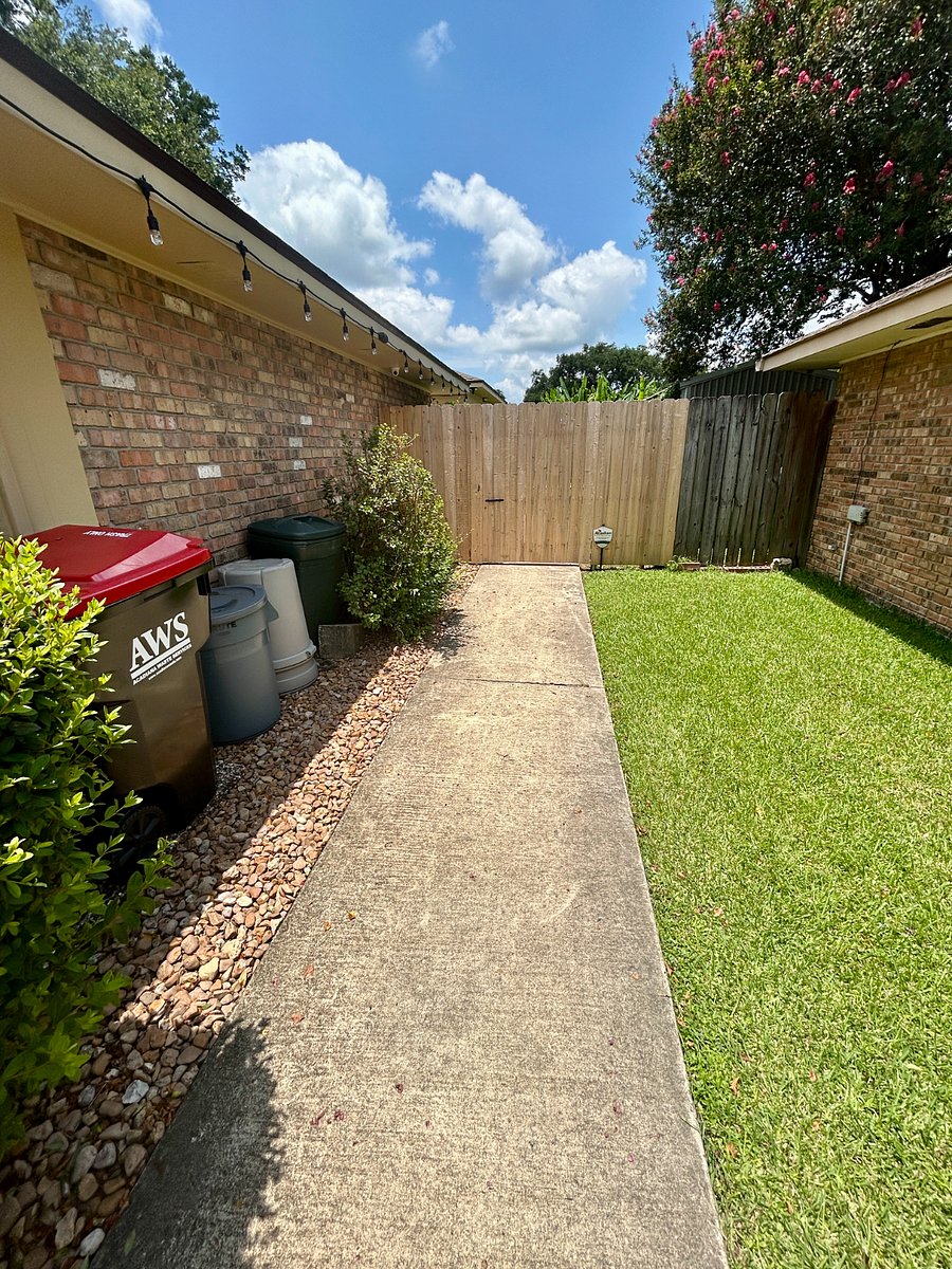 walkway from Tenant parking space to entry gate of rear cottage