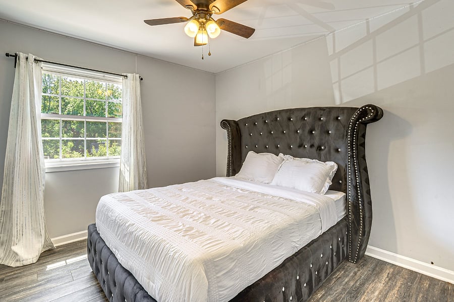 Bright Bedroom 2 featuring a relaxing street view