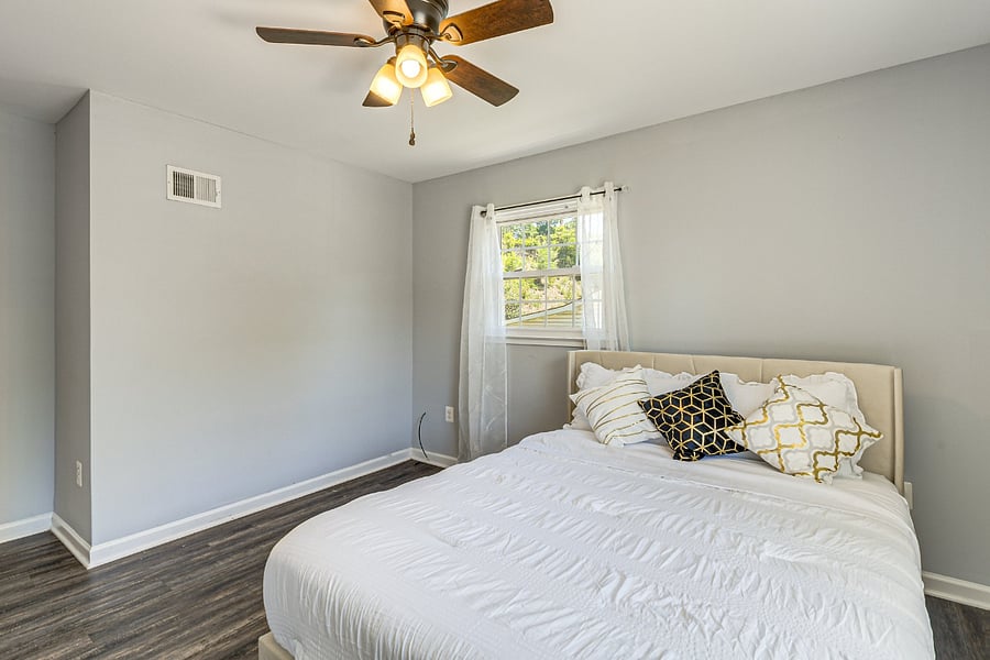 Bright Bedroom 3 featuring a lovely street view.