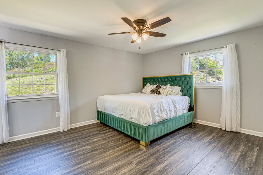 Spacious Bedroom 1 with a luxurious king bed and plenty of room to relax.
