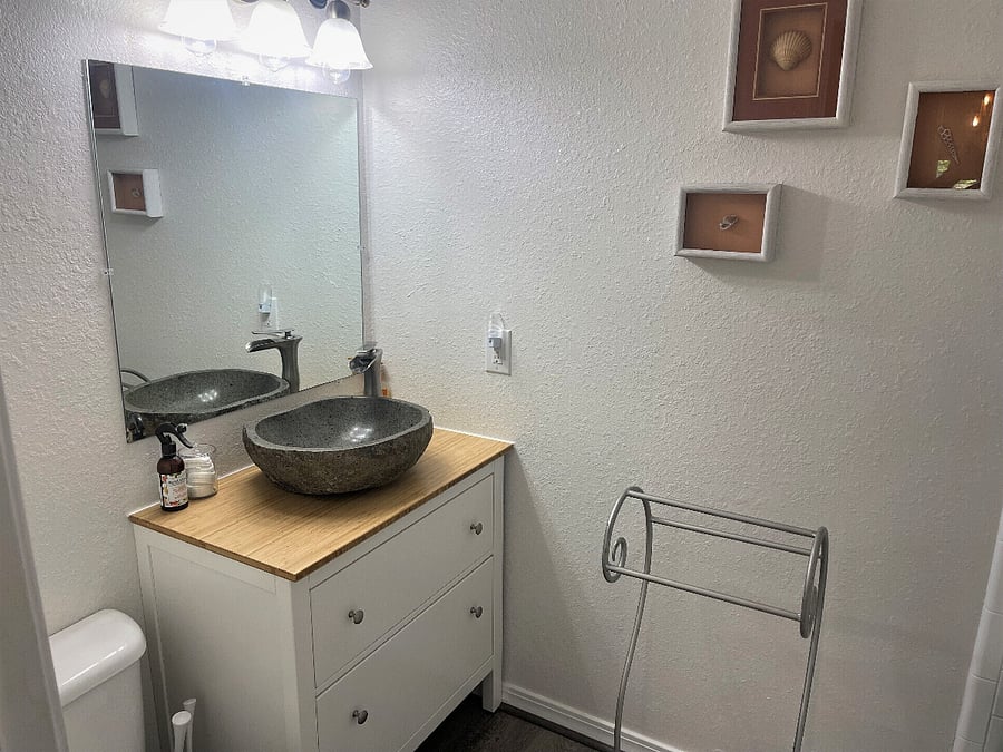 Guest bathroom next to laundry 