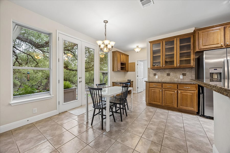 Great smaller table overlooking the back patio and yard. We can upgrade the chairs if needed. 