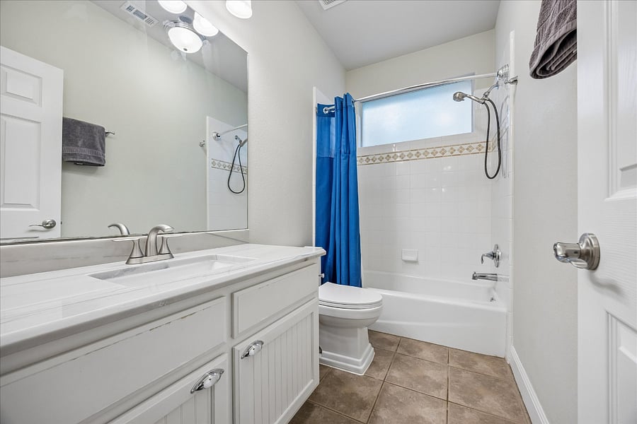 2nd full bath with matching quartzite countertops that match the master bath. And you'll love the look of our fancy toilets! :P