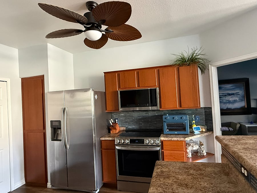 Kitchen with full size stainless appliances