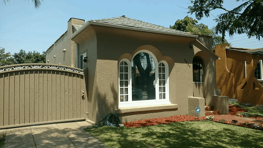 Street view with landscaped front yard