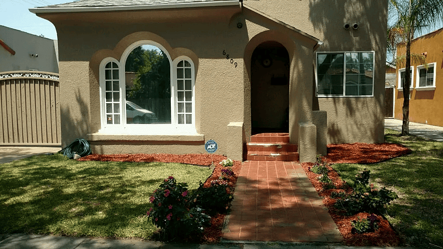 Side view with private gated driveway