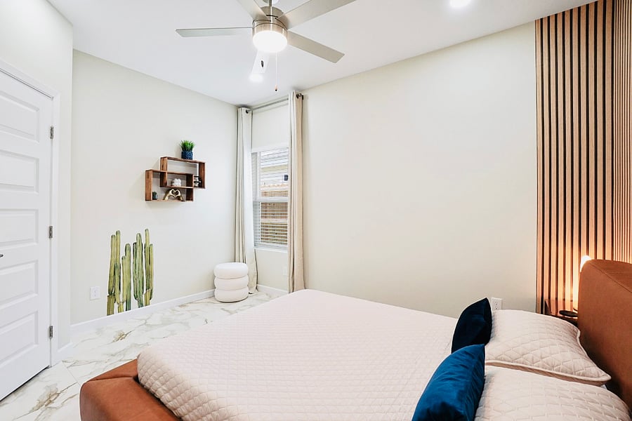 2nd bedroom with a queen Italian leather platform bed, with blackout curtains