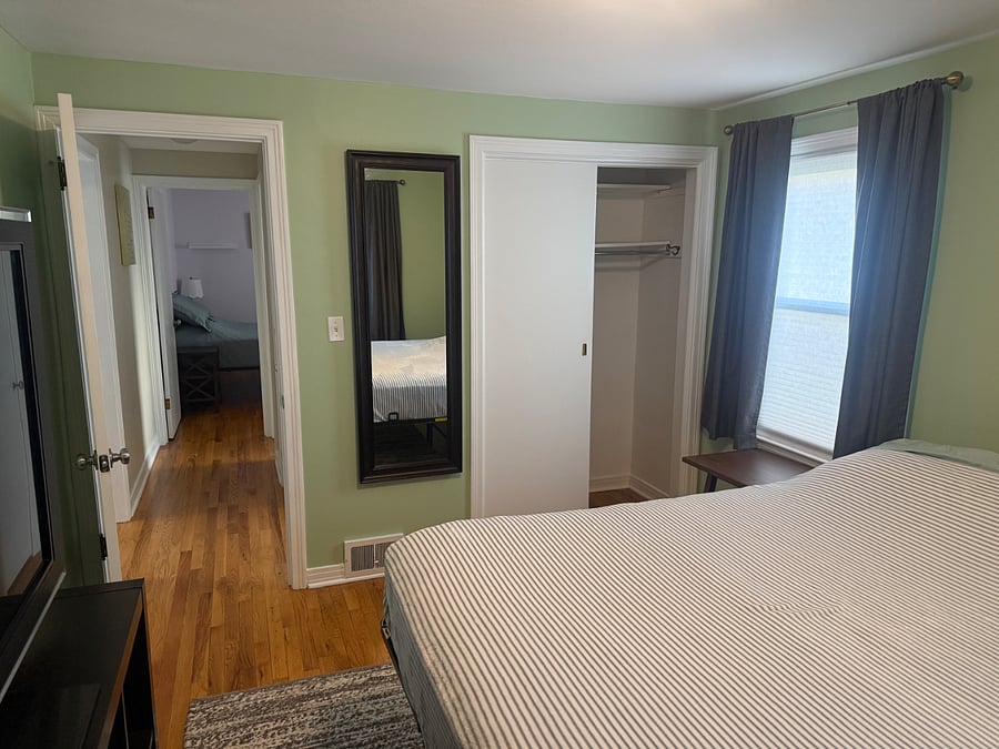 Main floor king bedroom, 55" TV with Roku & DVD hookup