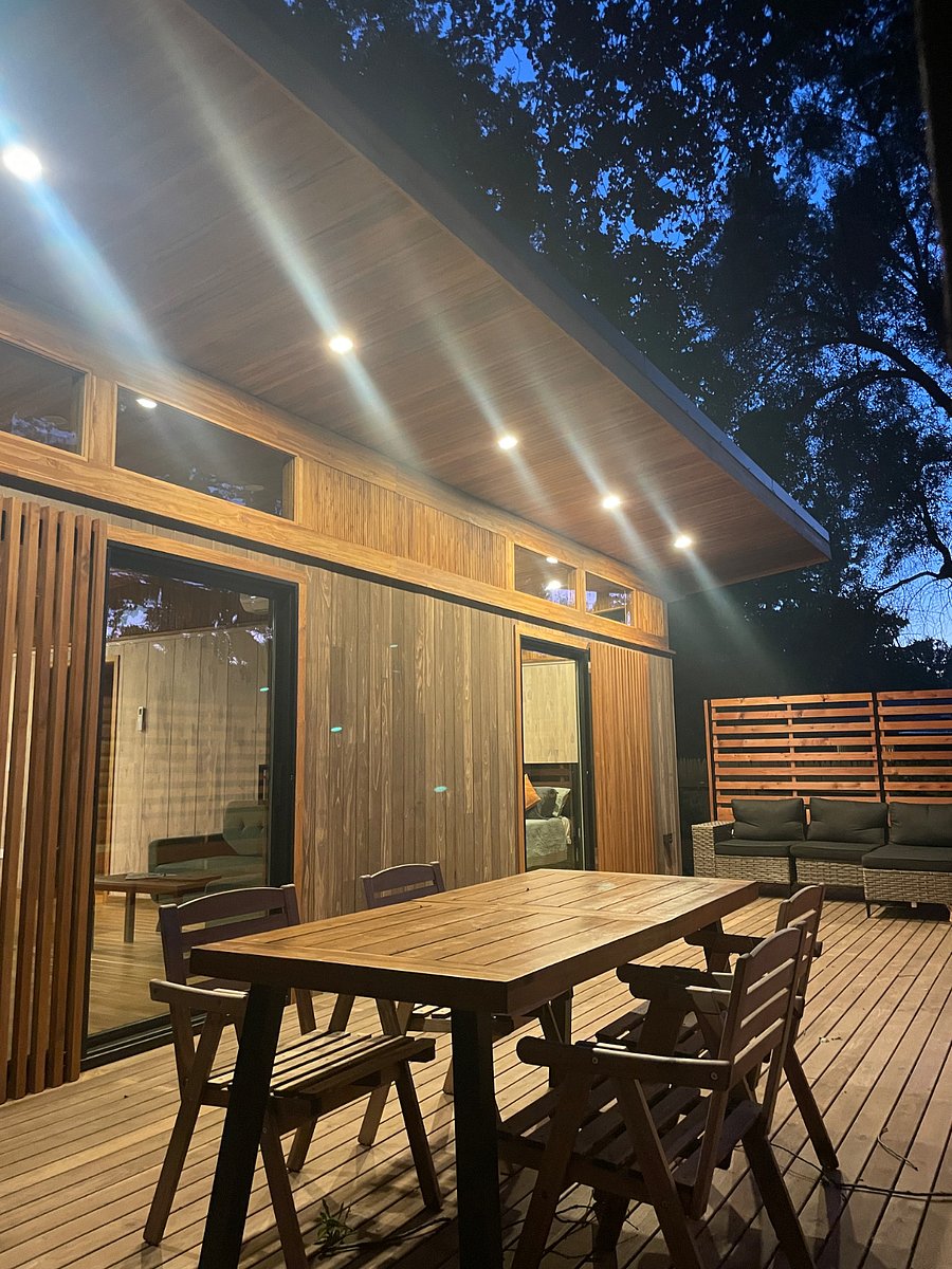 Private deck with large sliding doors from both the bedroom and living room