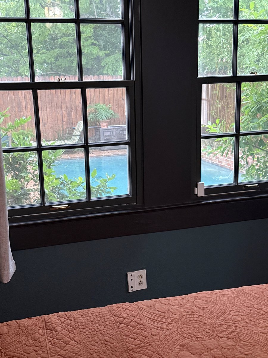 view of pool from main bedroom