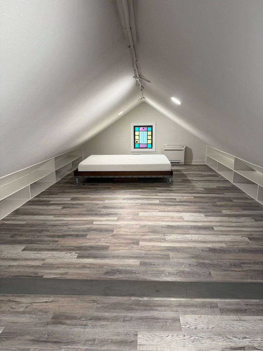 Other Side of huge lofted bedroom- low ceiling 
