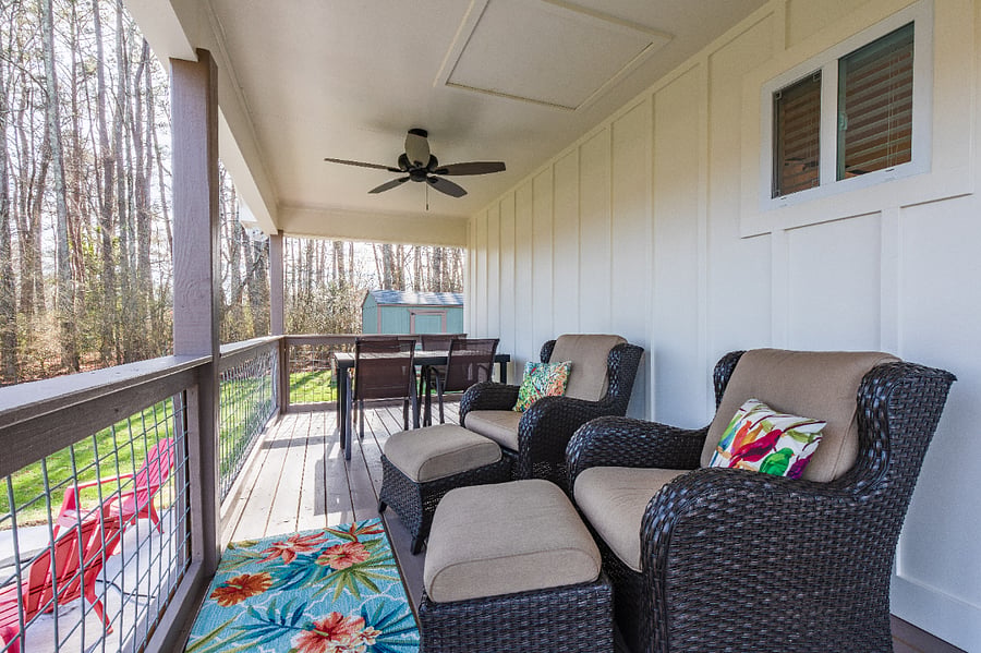 This back porch is now screened-in.  Very quiet and peaceful with views of a private backyard and an open field.  Perfect for bird watching, working on laptop, and maybe spotting deer and turkey!