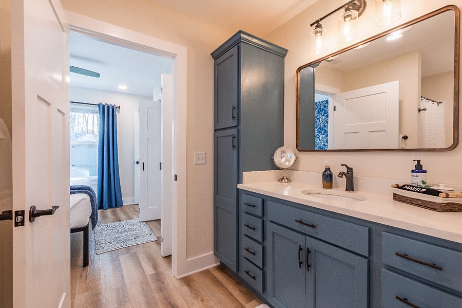 Spacious bathroom with plenty of storage space. 