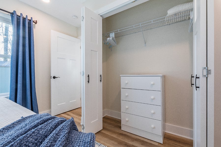 Dresser provided as well as space for hanging clothing.  There is an additional hall closet with more space for hanging clothing.