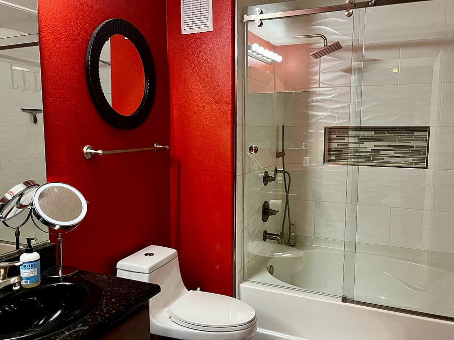 Rain shower and soaking tub.