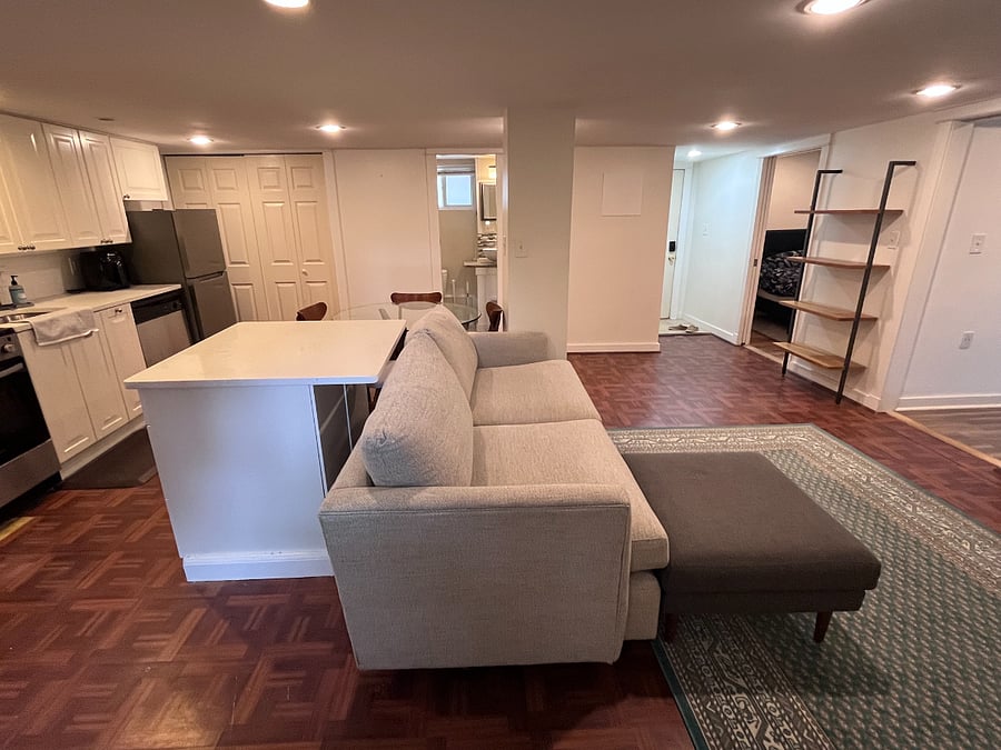 Living room and the kitchen island with ample storage