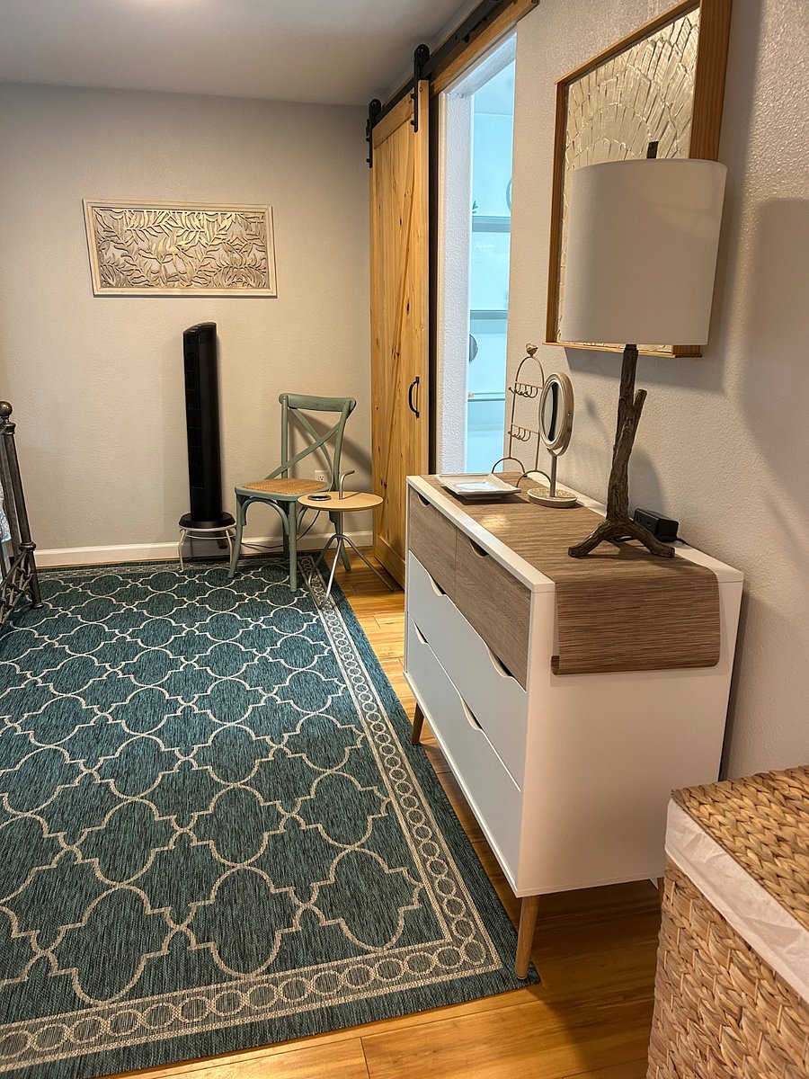 Entry to bedroom has full size dresser.