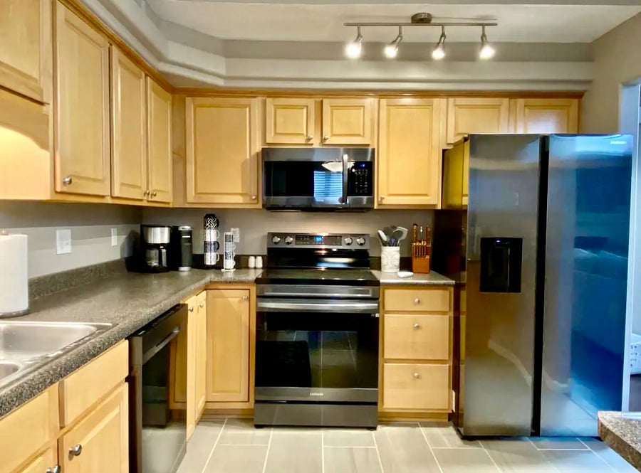 Black stainless steel fingerprint resistant appliances.