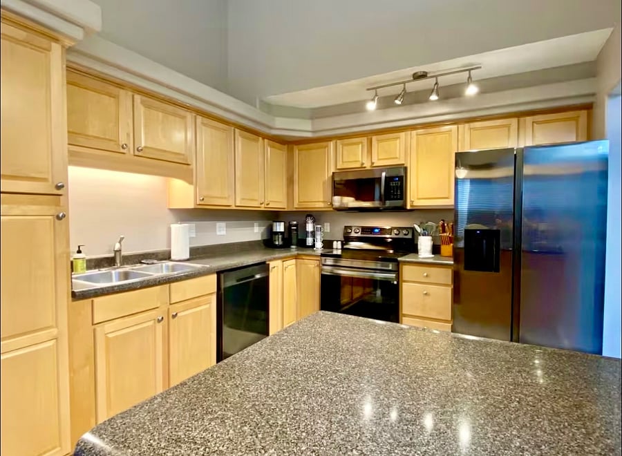 Kitchen island with two barstools
