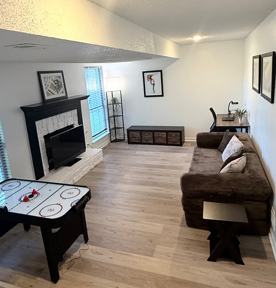 Lower level living area with work place