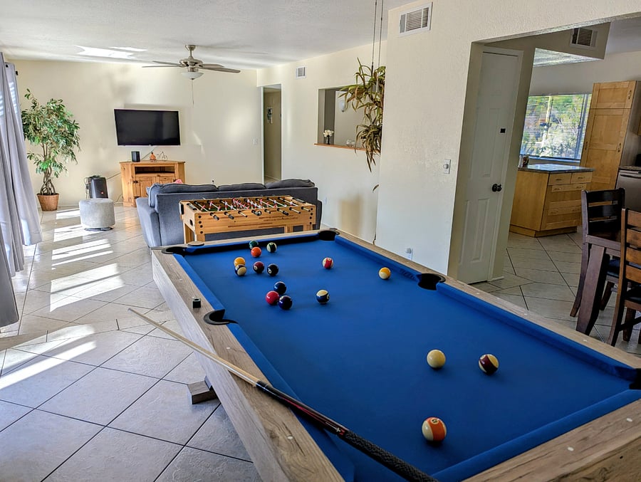 Pool table and large living room 