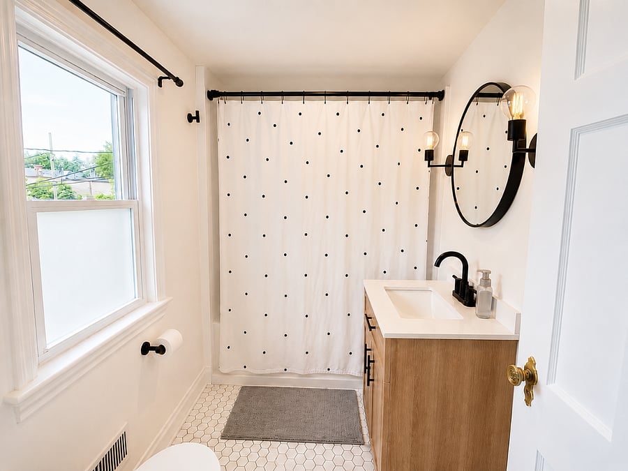 Enjoy a bright, updated bathroom with contemporary finishes, a spacious vanity, full bathtub and shower, modern fixtures, and plenty of storage space. Designed with comfort and functionality in mind, its the perfect place to start and end your day.