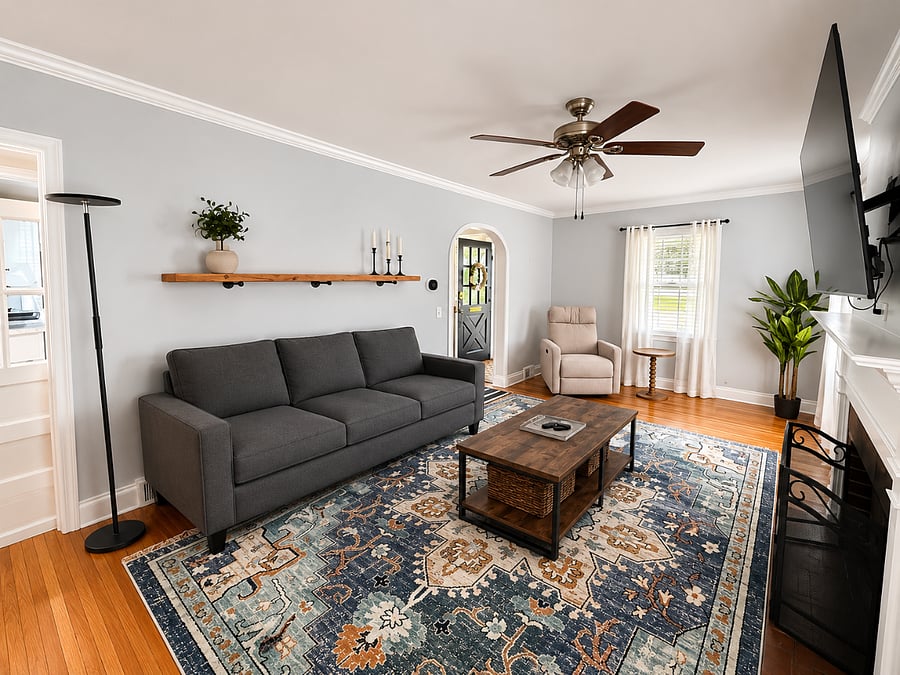 The heart of the home, this beautifully furnished living room combines comfort and style with a large 65-inch Samsung Smart TV, plush seating, hardwood floors, and abundant natural light. Its the perfect place to stream your favorite content, enjoy a quiet evening, or spend time with family and friends during an extended stay. 