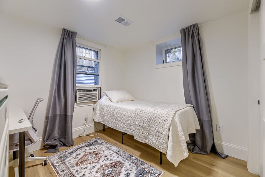 Bedroom 2, Twin Bed and Desk. Option to swap desk with second twin bed.