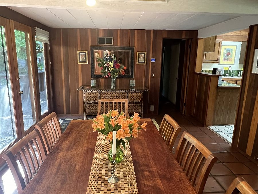 Dining room table seats 10. Looks onto back patio.